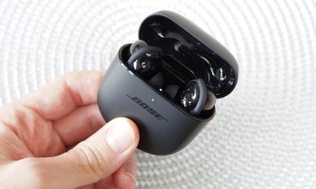 The Bose QuietComfort Earbuds 2 case held in your fingers.