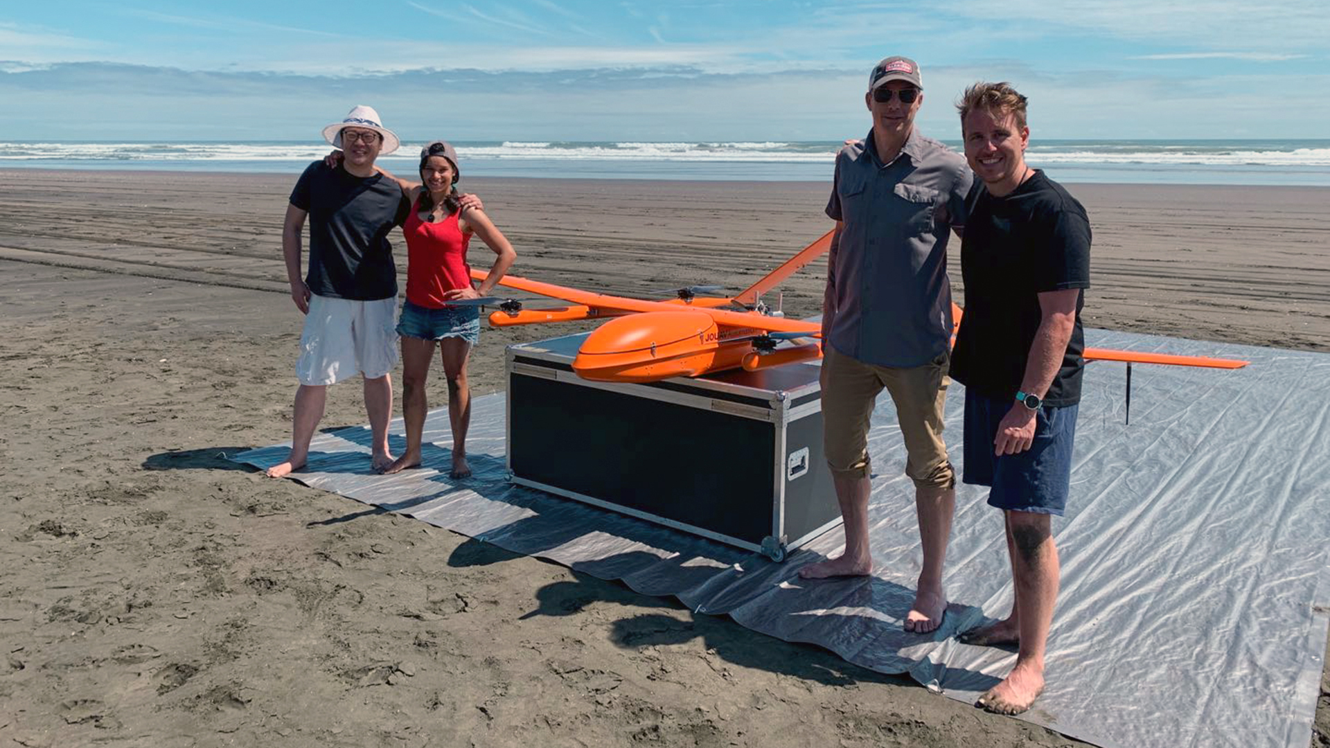 The MAUI63 team poses with the drone.