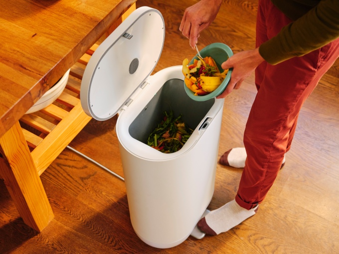 Food is disposed of in a Mill Food Waste Container.