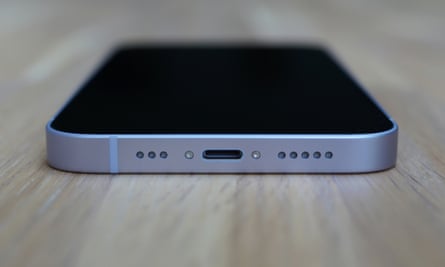 The Lightning port at the bottom of the iPhone 14.