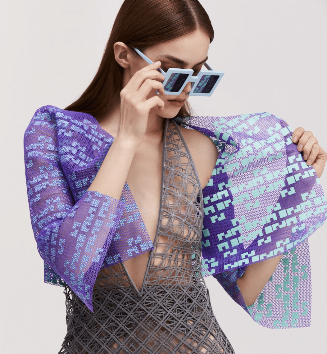 a woman wearing 3D printed fashion funded by Nouns DAO