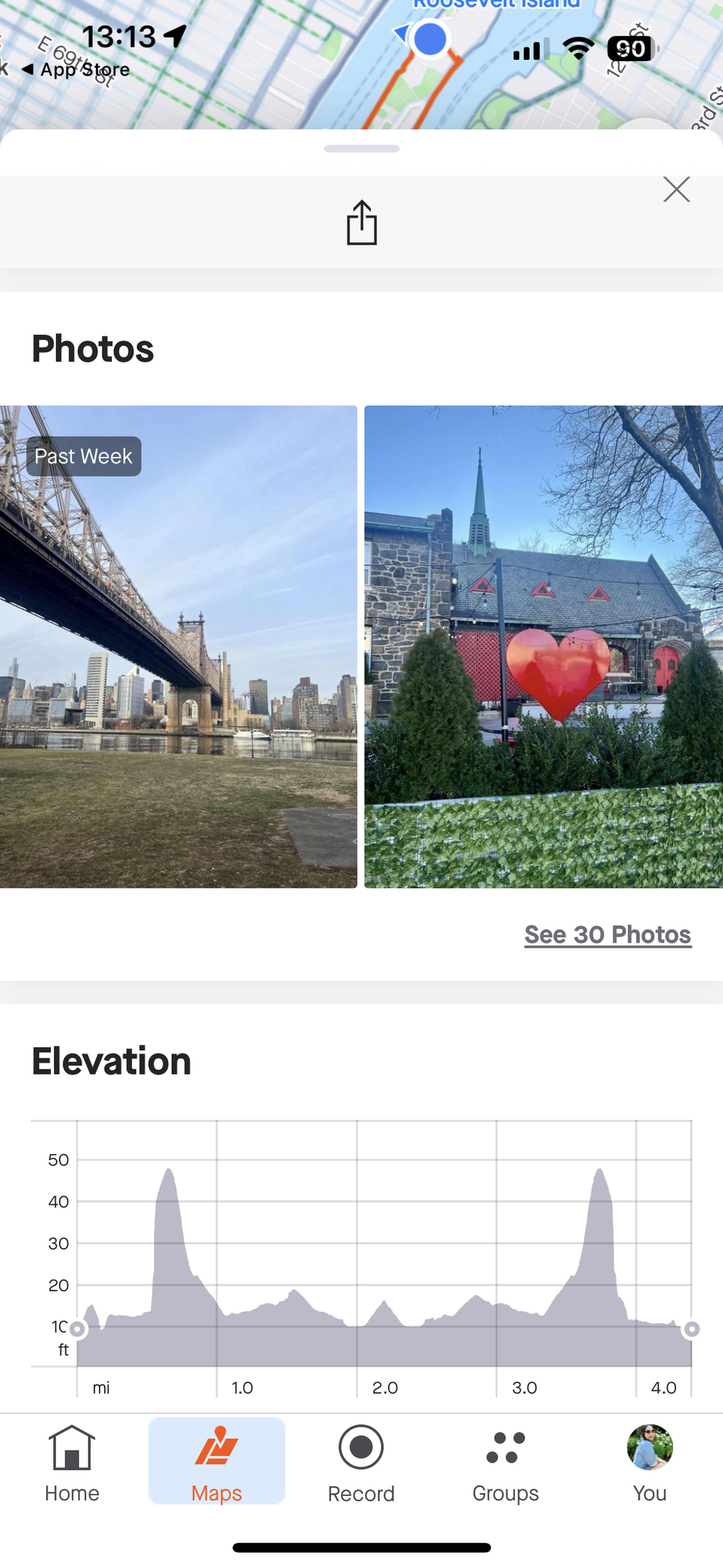 Screenshot of recommended routes photos showing a building with a large metal heart in front of it.