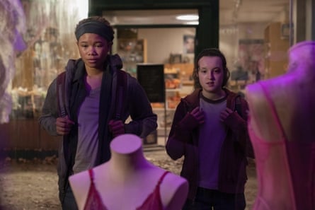 Riley (Storm Reid) and Ellie (Bella Ramsey) gaze at a Victoria's Secret store in the mall.