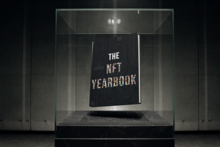 The NFT yearbook in a glass case