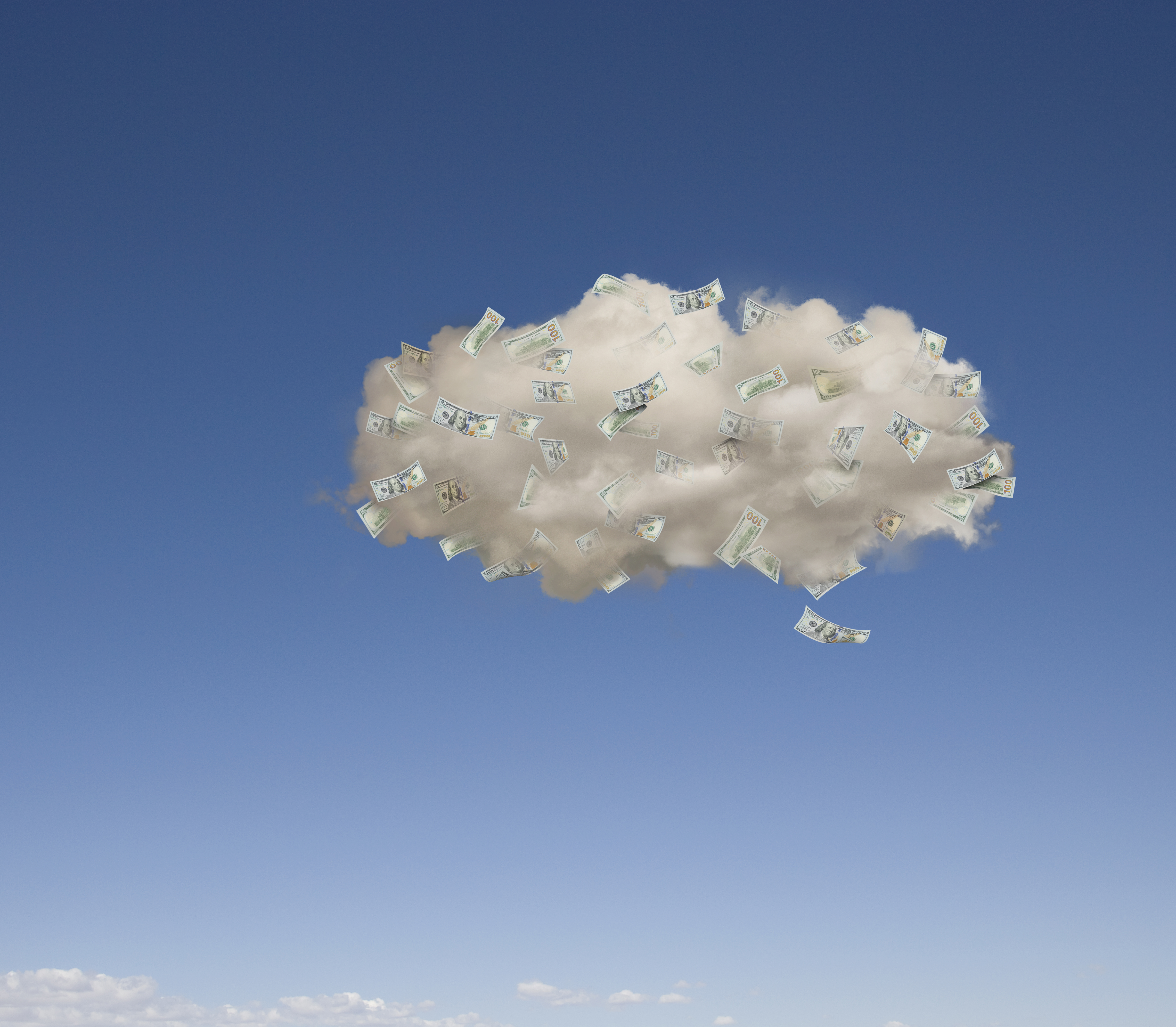 Image of money floating on a cloud against a blue sky.