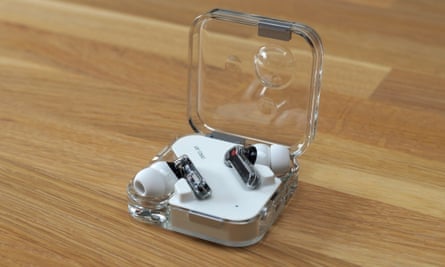 Nothing Ear 2 earphones in their semi-transparent charging case.