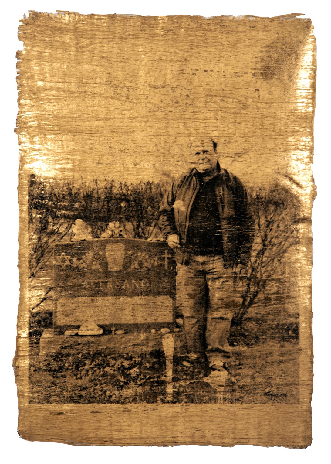 A mixed media silkscreened photograph of a man holding a flower standing by his wife's grave.  There is an open space on the tombstone where his name will be written when he dies.