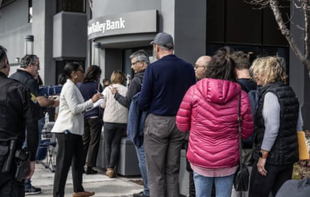 Customers lined up to enter the Silicon Valley Bank in Santa Clara, California, on Monday.