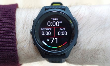 The Garmin Forerunner 265 displaying various metrics while tracking a run.