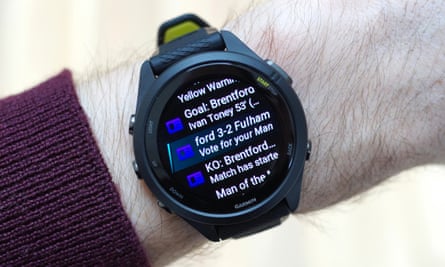 A series of notifications from a connected smartphone displayed on the Forerunner 265S.