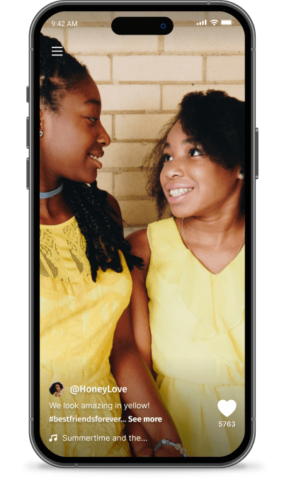 An example of the Betweened feed, featuring two young girls and captioned, "We look amazing in yellow! #bestfriendsforever." 