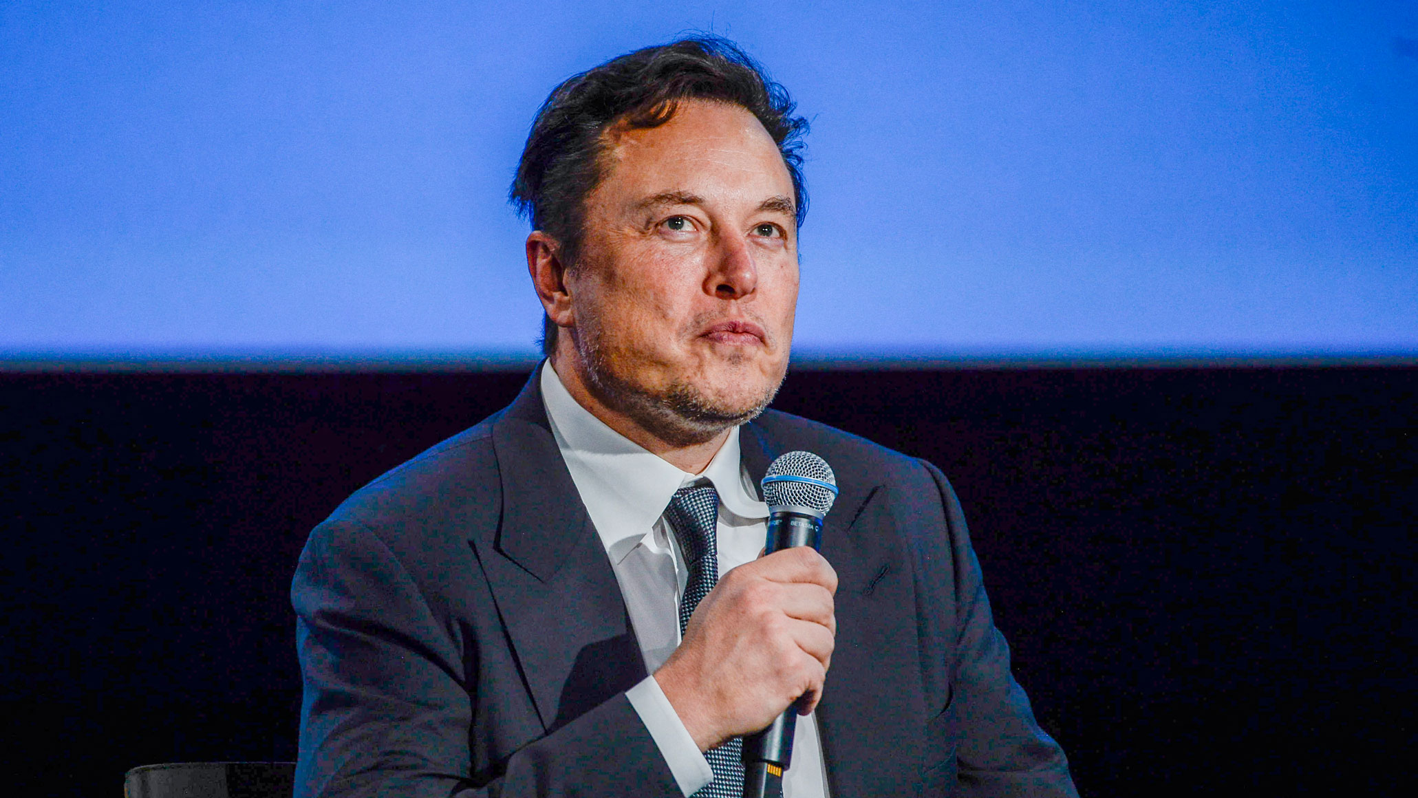 Tesla CEO Elon Musk looks up as he addresses guests at the Offshore Northern Seas 2022 (ONS) meeting in Stavanger, Norway, on August 29, 2022.
