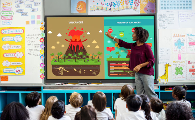 Teacher and students using LG smart board