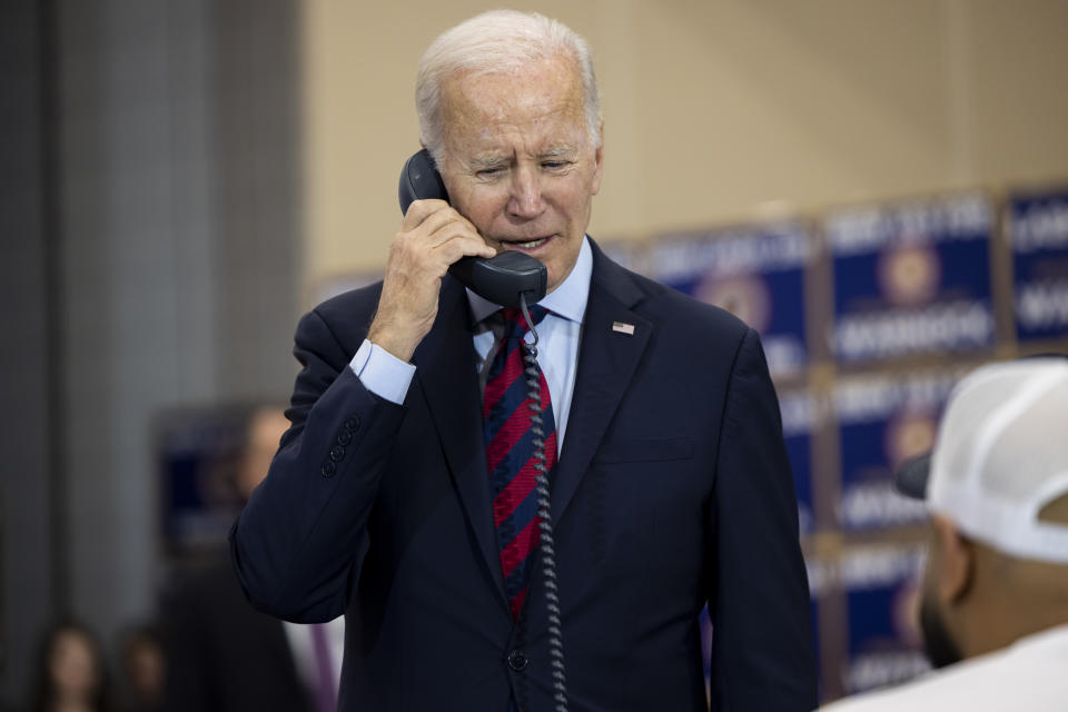 BOSTON, UNITED STATES - DECEMBER 2: President Joe Biden participates in an International Brotherhood of Electrical Workers (IBEW) phone banking event on December 2, 2022 in Boston, Massachusetts, for Senator Reverend Raphael's re-election campaign Warnock (D-GA).  (Photo by Nathan Posner/Anadolu Agency via Getty Images)