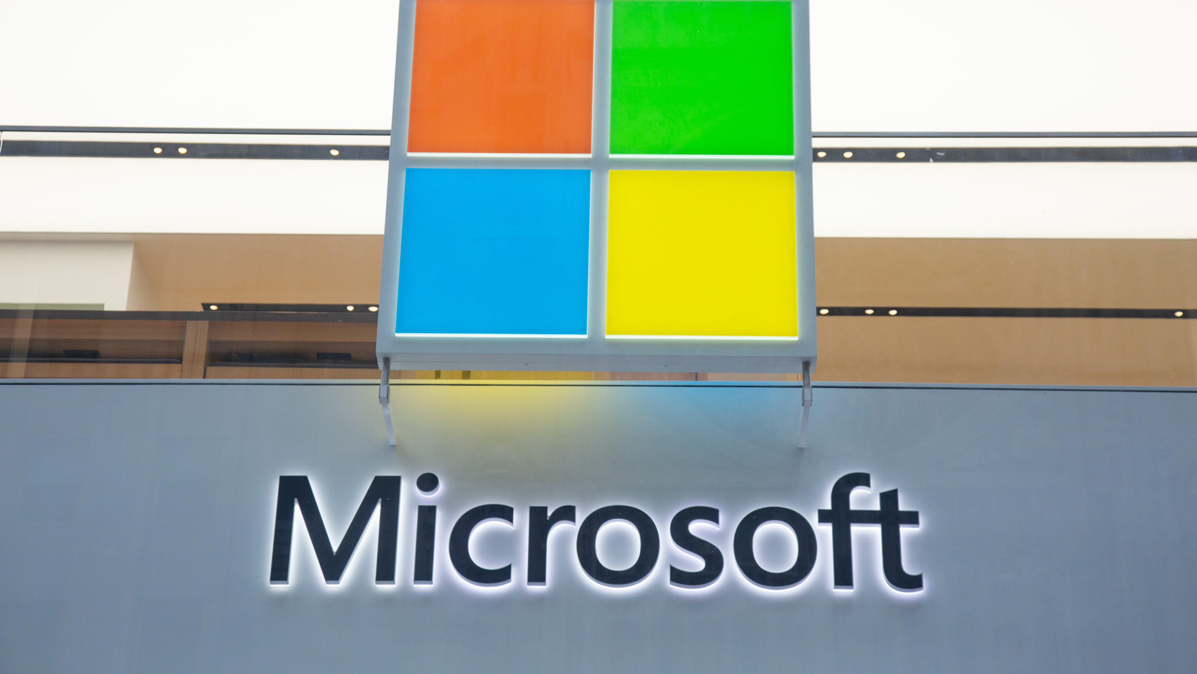 An entrance to the Microsoft store with the company logo.