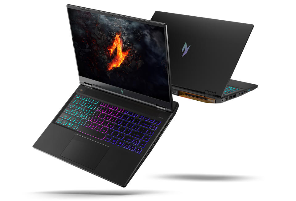 Product marketing image of the Acer Nitro 14 gaming laptop. Two models float dramatically in the air: one facing forward with its screen and keyboard visible, the other (behind) showing a rear view.  Gray blue background.