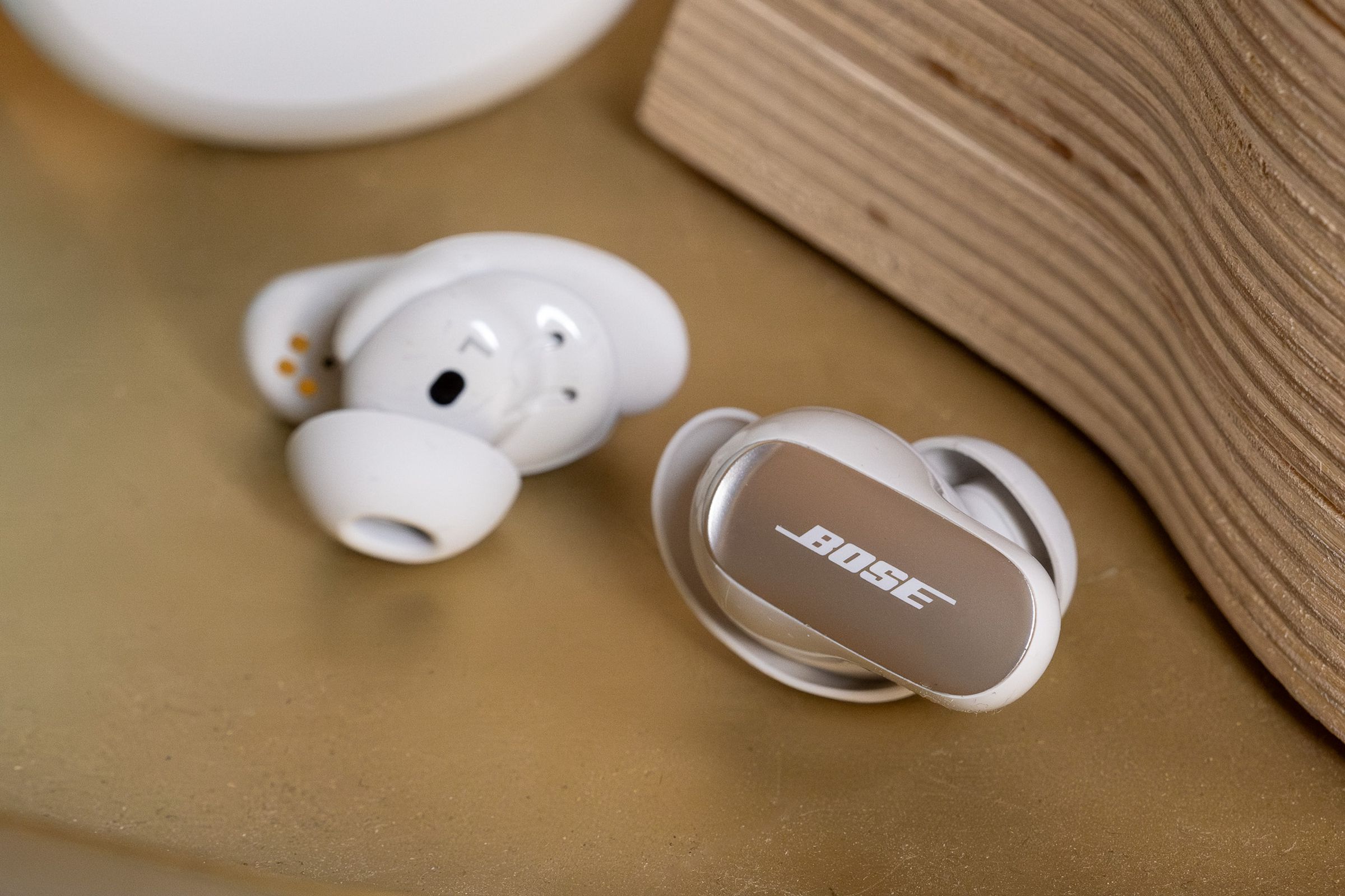 A photo of Bose’s QuietComfort Ultra Earbuds.