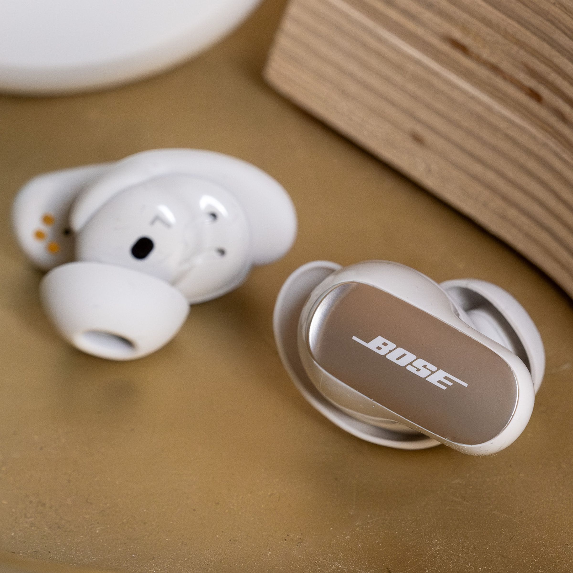 A photo of Bose’s QuietComfort Ultra Earbuds.