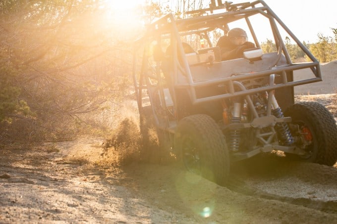 ATV test vehicle driving on off-road terrain