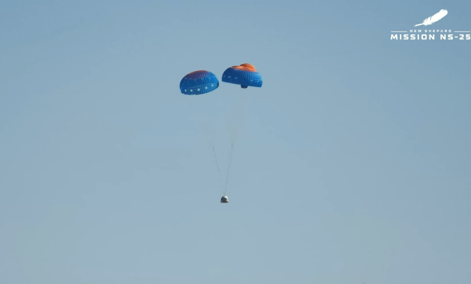 Blue Origin crew capsule seen descending to Earth with two parachutes deployed