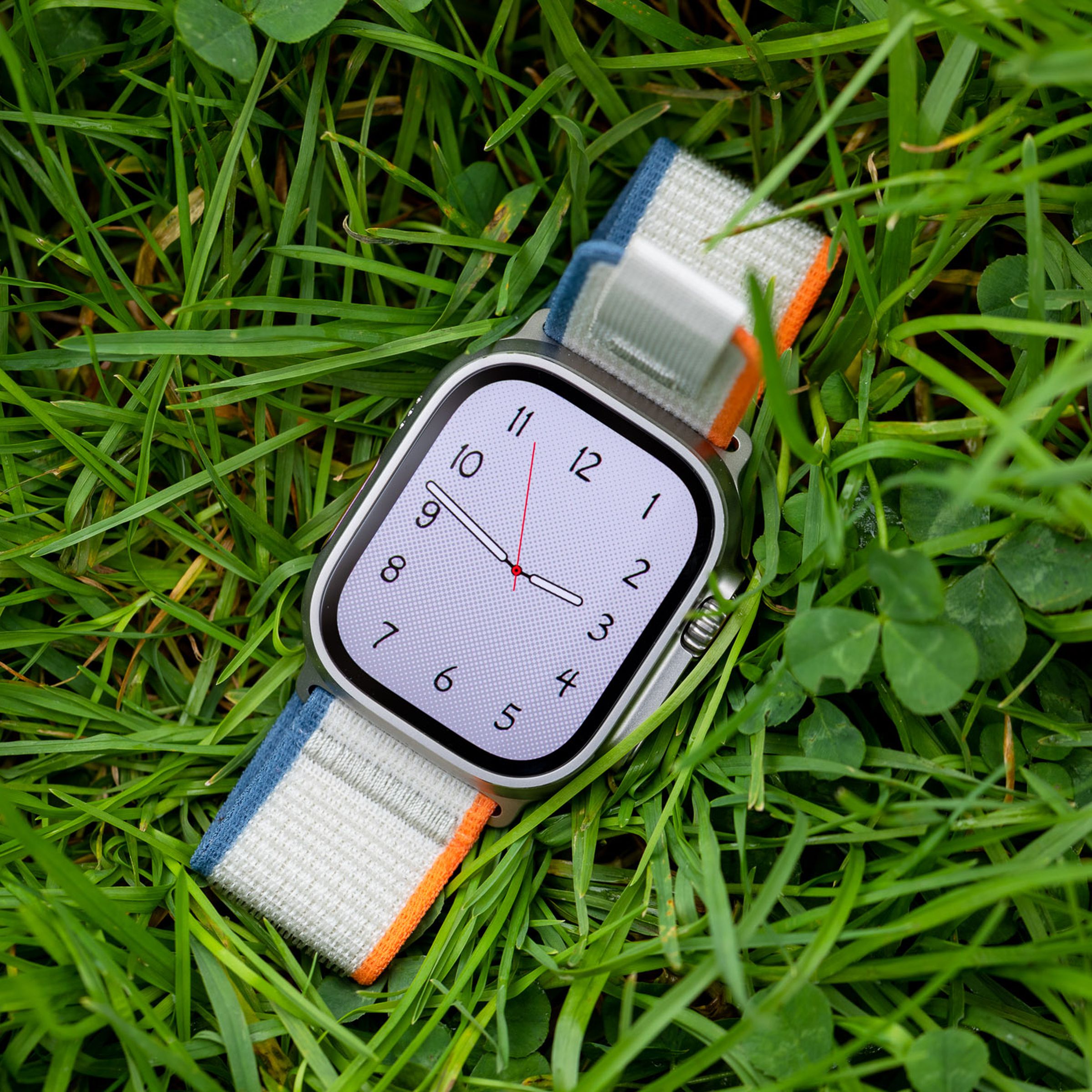 The Apple Watch Ultra 2 on grass.