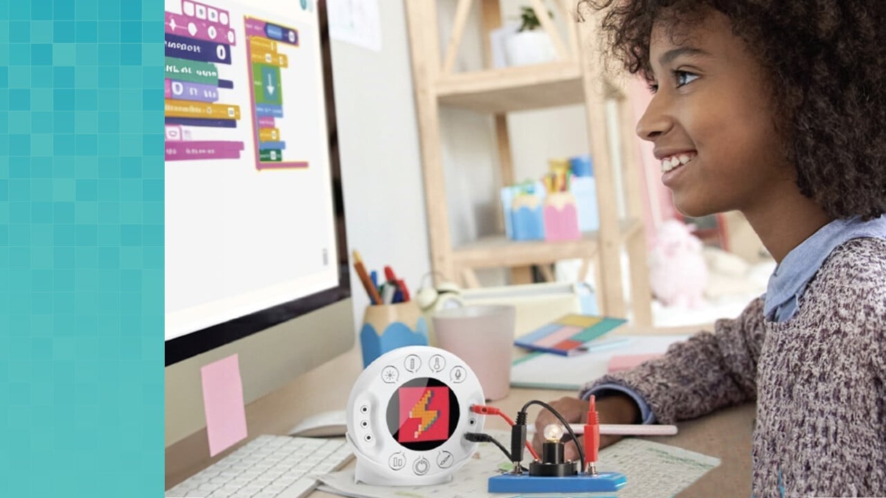 A student creates code on a computer while the Xploris Labdisc for Kindergarten to Eight students measures data on the desk next to her.