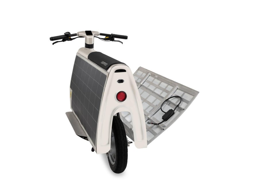 Image of the Lightfoot Solar Scooter with the cargo door open.