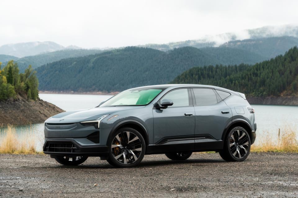 The Polestar 3 electric SUV next to a lake.