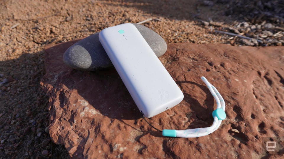 The Nimble Champ Pro battery sits on a rock outdoors in the morning sun. 