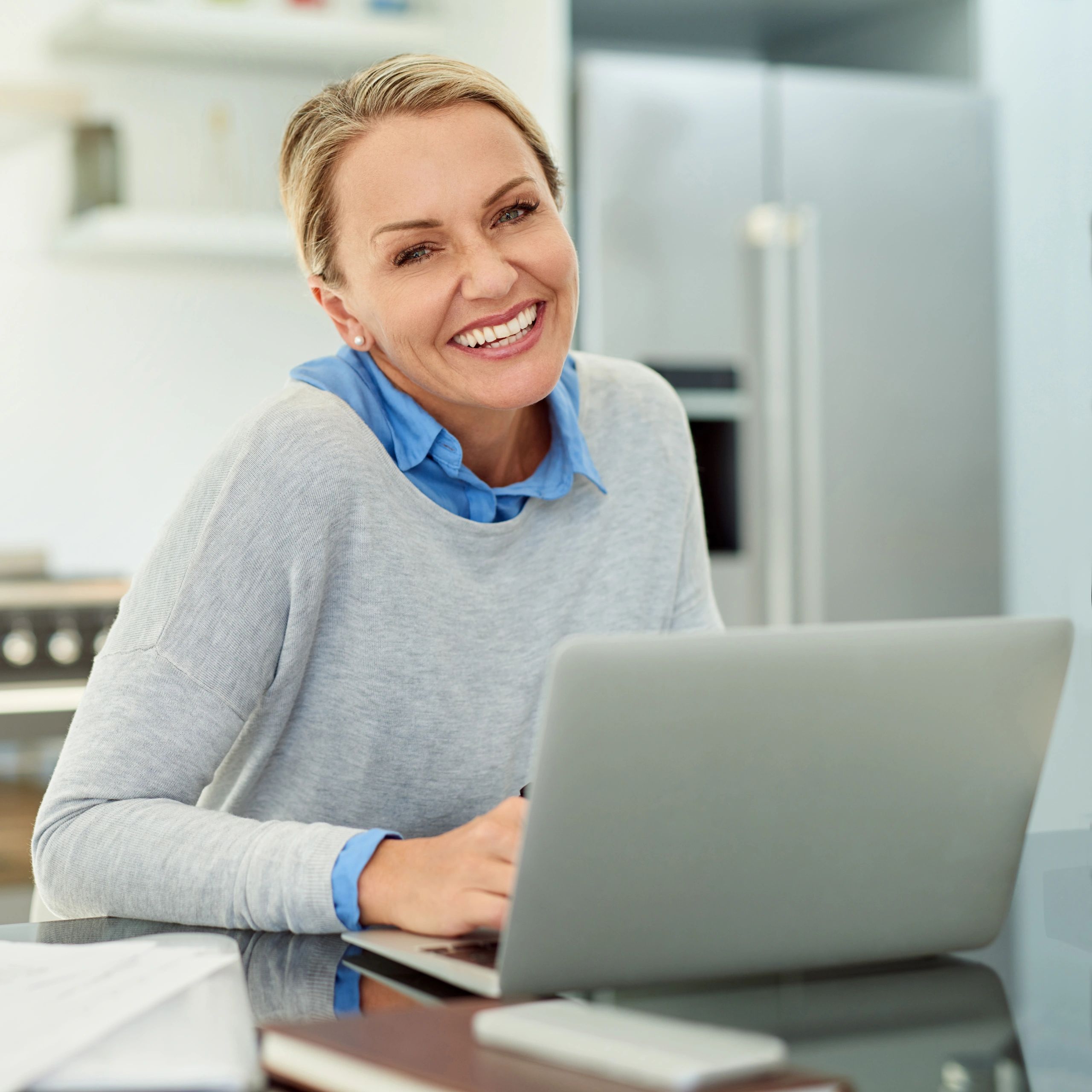 Portrait of a business client working on a laptop