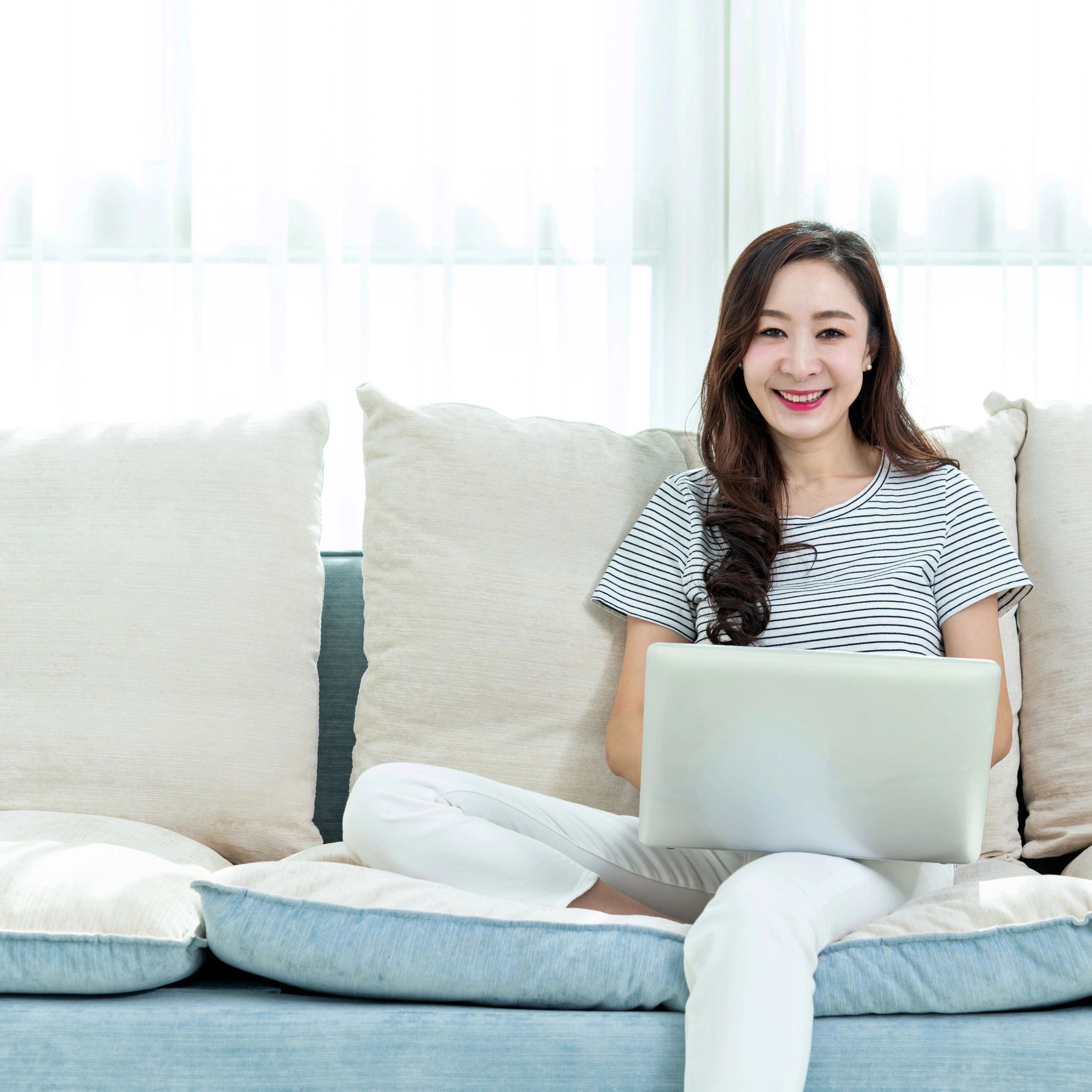 Portrait of a client using a laptop at home