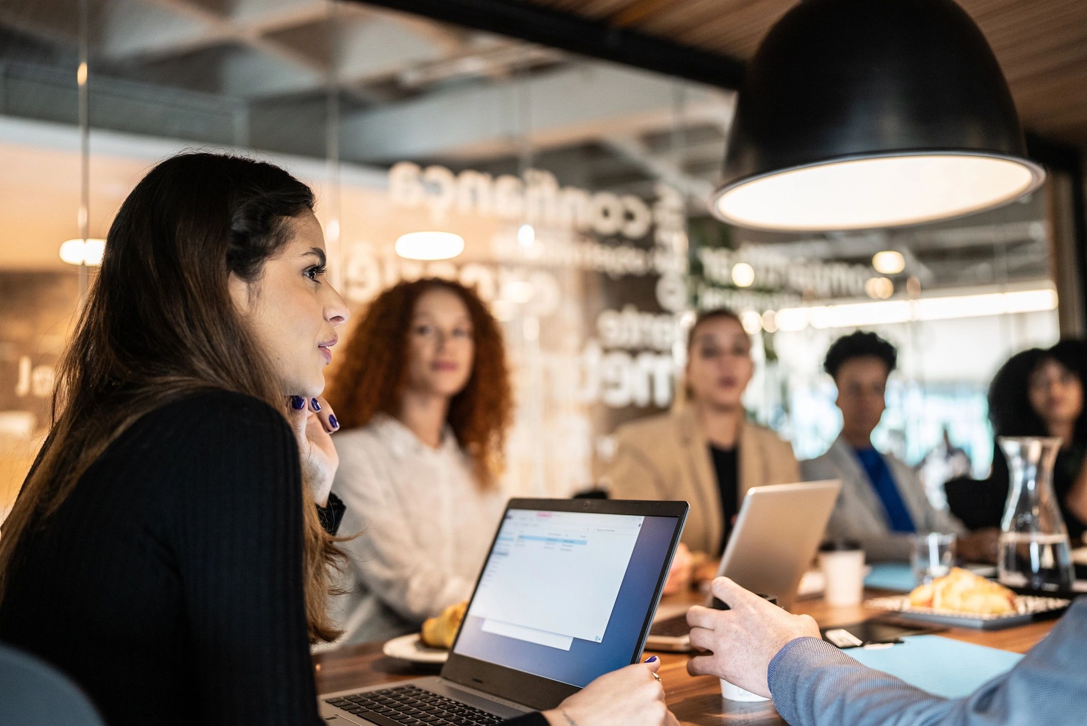 Coworkers meeting in an office